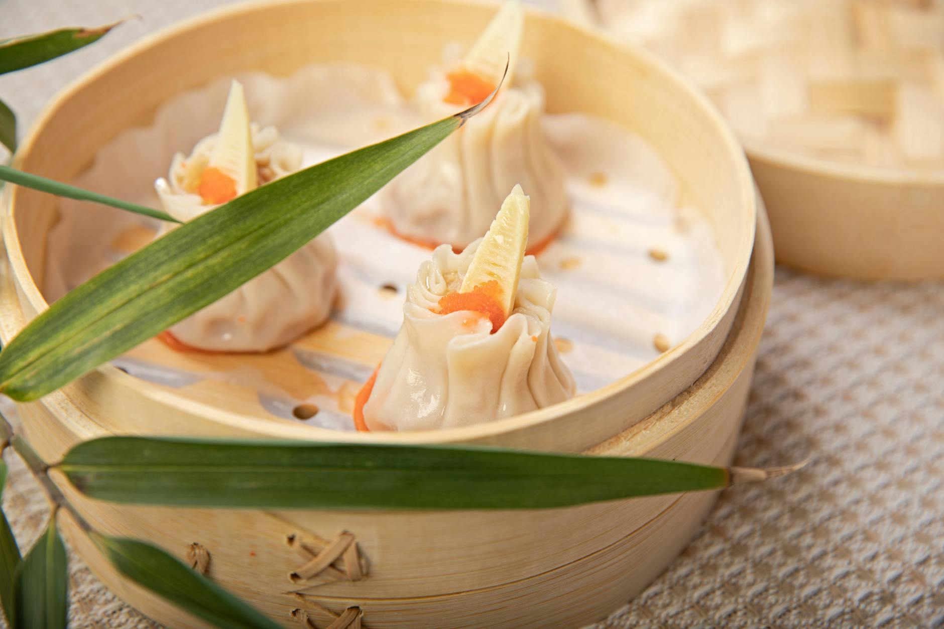 Shanghai food guide — dim sum served in traditional bamboo steamers at a local restaurant