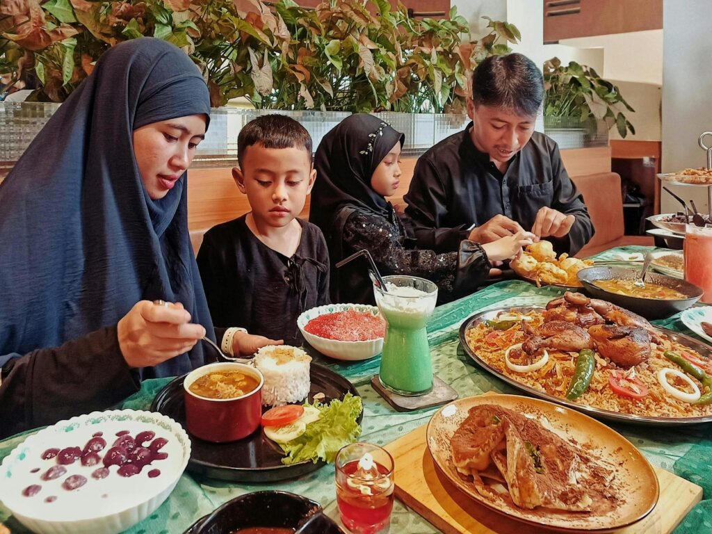 Family-friendly restaurant dining in Shanghai with children enjoying Asian cuisine