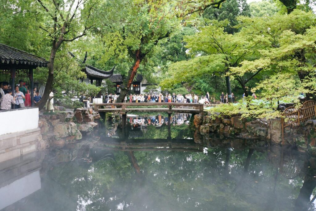 Suzhou classical garden with traditional pavilions and lush landscaping perfect for day trips from Shanghai