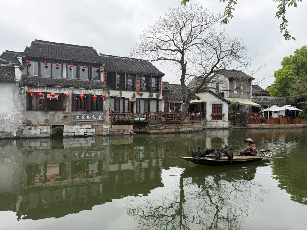 Zhujiajiao ancient water town canals with traditional boats and stone bridges near Shanghai