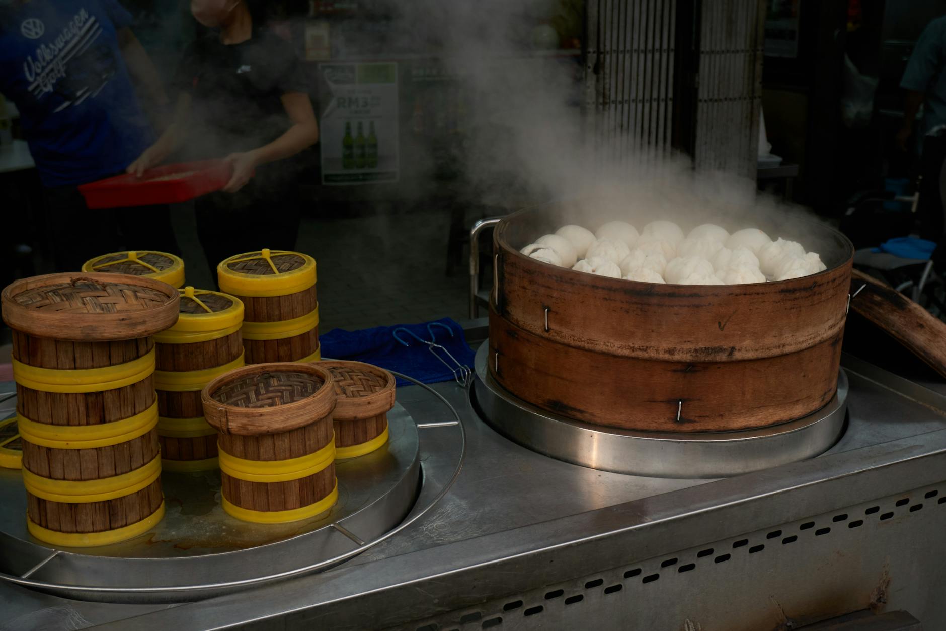 Cheap eats in Shanghai steamed baozi buns in a bamboo steamer basket