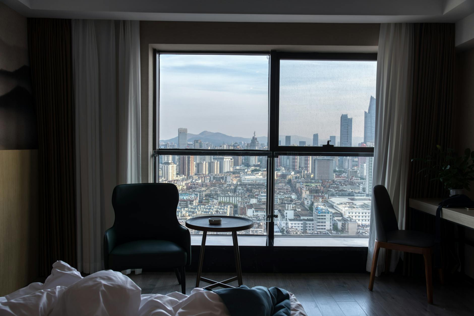 Hotels near the Bund Shanghai skyline view of the historic waterfront from a Pudong luxury hotel room