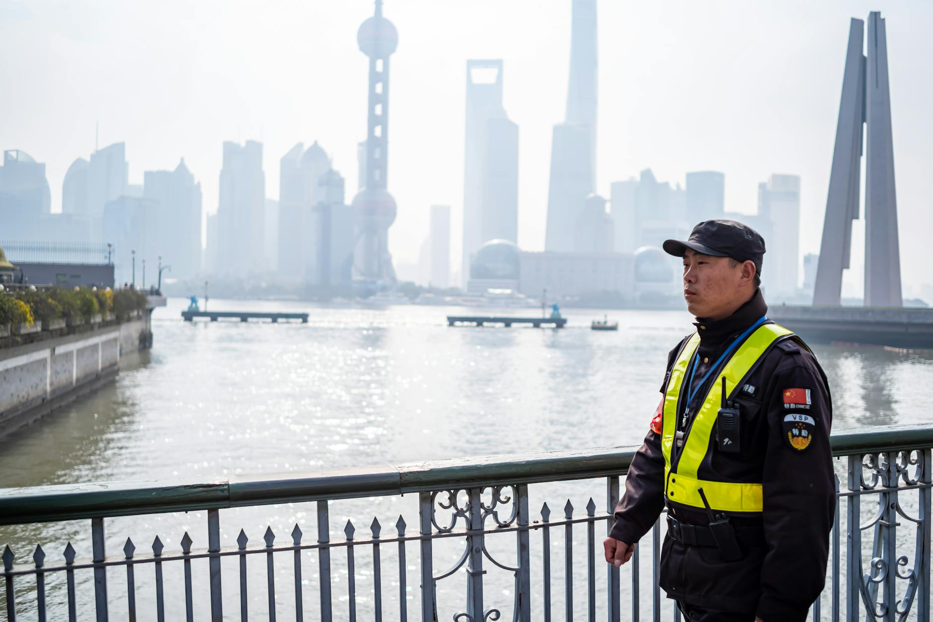 Is Shanghai safe police officer on duty in urban Shanghai