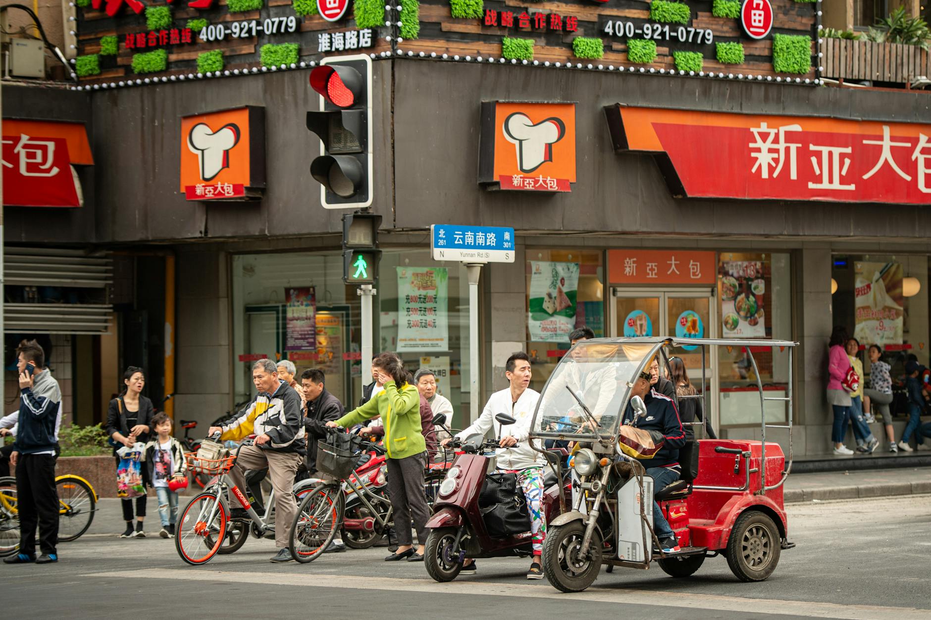 Shanghai busy intersection with pedestrians safety tips