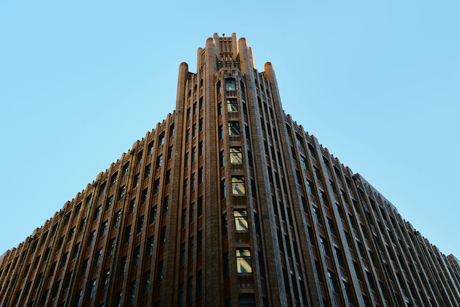 Streamlined Art Deco building facade with strong vertical lines typical of 1930s architecture