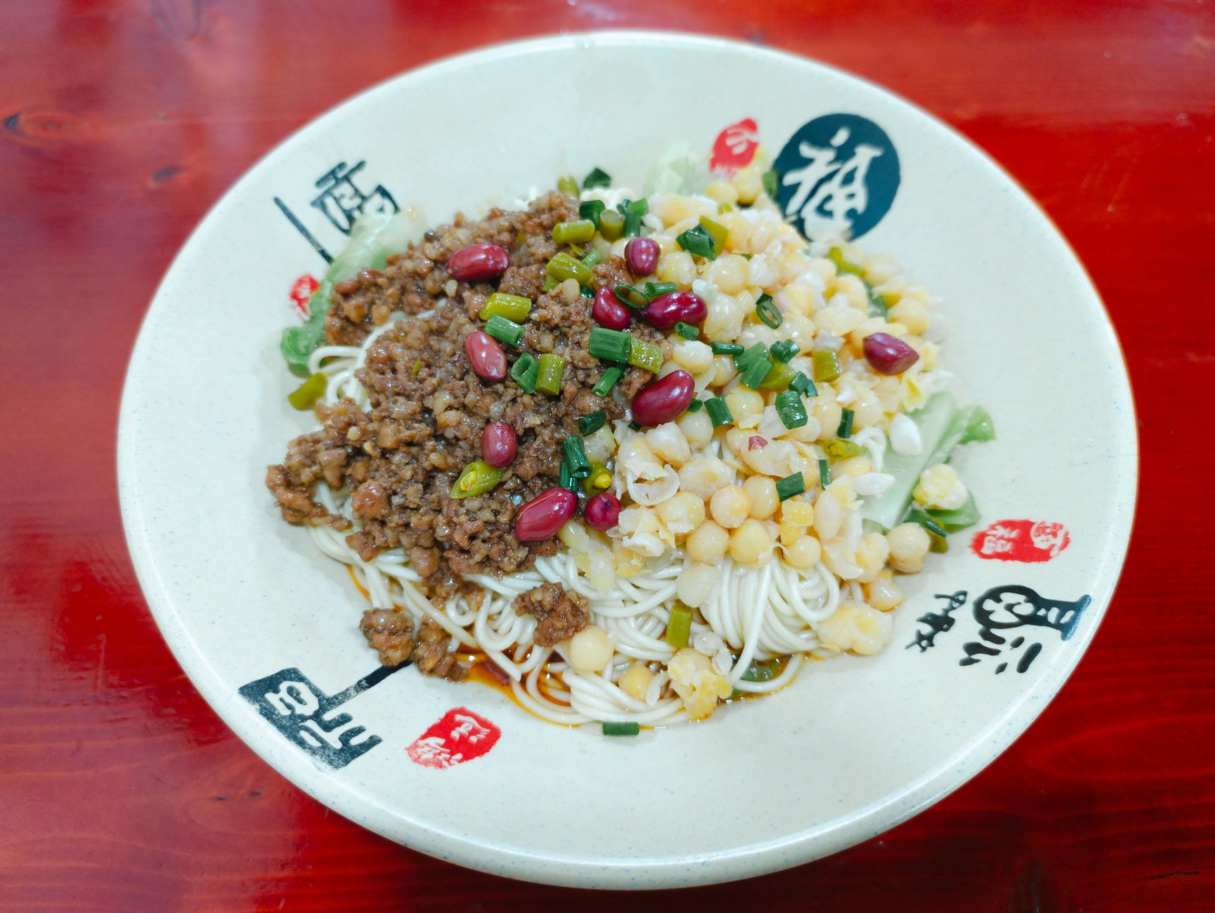 Hand-pulled noodles with minced pork and scallions at a Shanghai restaurant