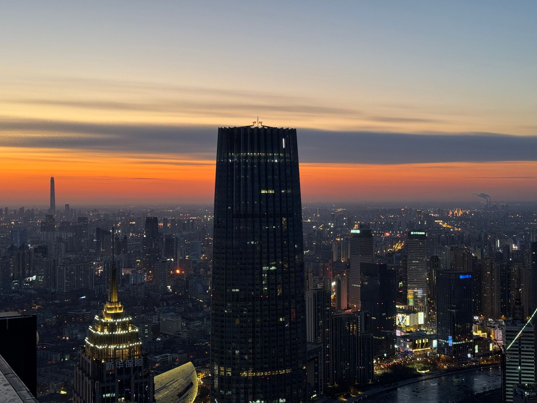 Shanghai Tower observation deck sunset visitors silhouetted