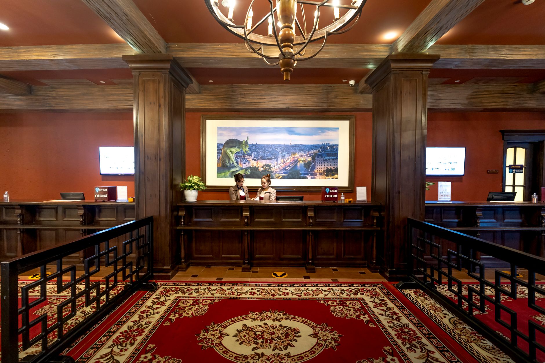 A hotel reception desk in Shanghai where passports are checked and registration is handled