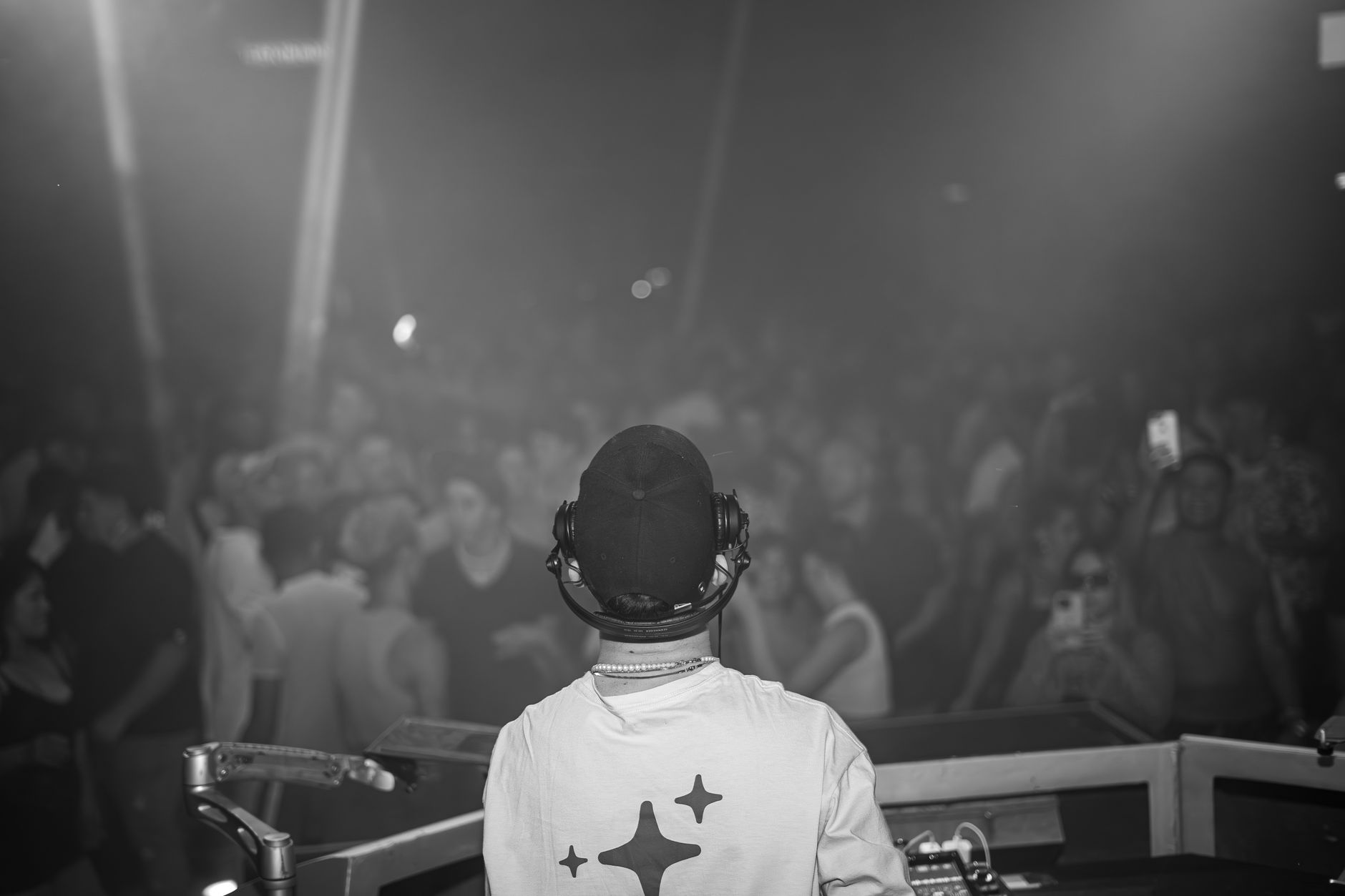 A DJ playing to a full room at a late-night club, the format most Shanghai nightclubs run on weekends