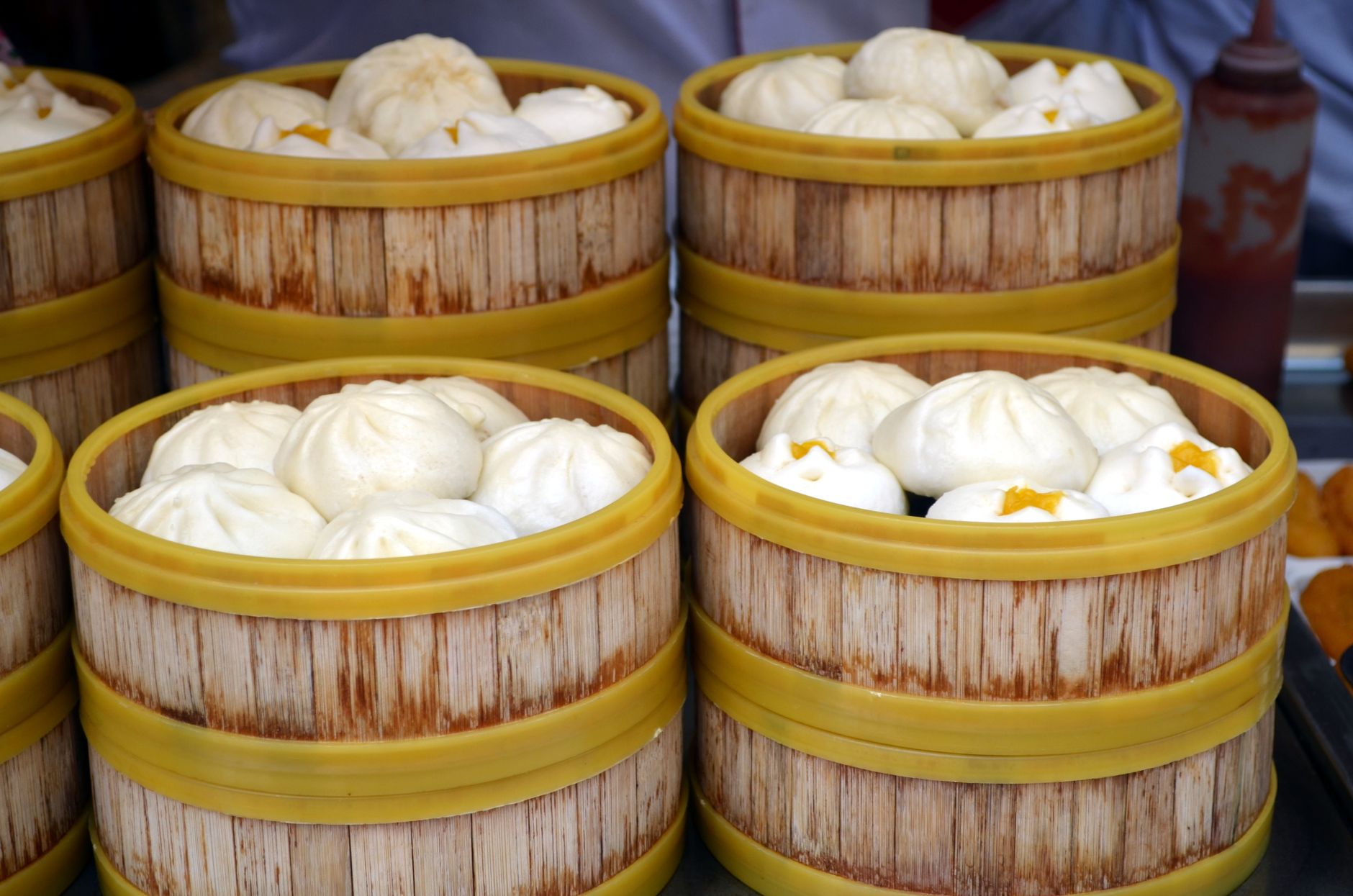 Steamed vegetarian buns and dumplings in bamboo steamers, a staple of vegetarian eating in Shanghai