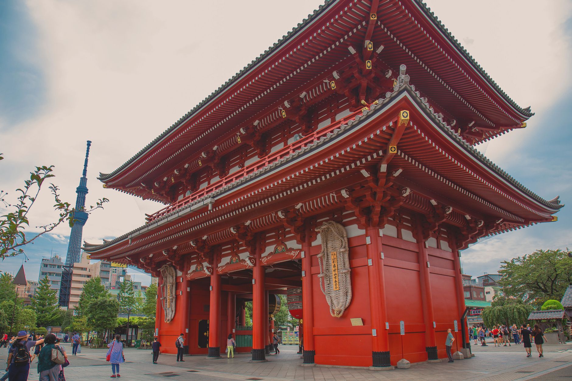The red Hozomon Gate at Senso-ji Temple in Asakusa, Tokyo, with the Tokyo Skytree behind