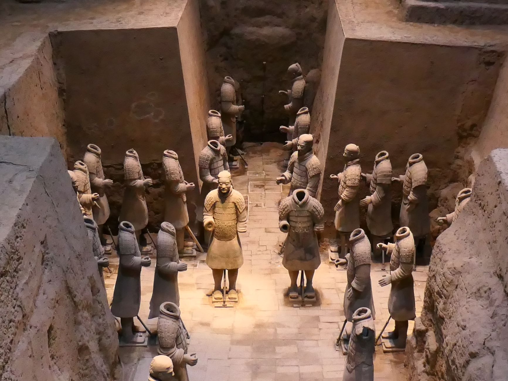 Rows of terracotta warriors in the excavation pits at Xian